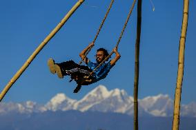 Enjoying traditional Swing in Nepal