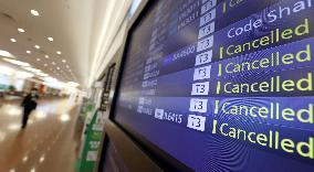 Quiet Haneda airport after global entry ban amid virus fear