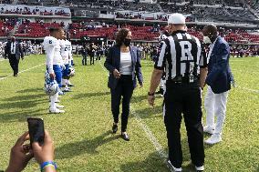 Kamala Harris flips a coin ahead of Howard University vs Hampton University football game