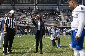 Kamala Harris flips a coin ahead of Howard University vs Hampton University football game