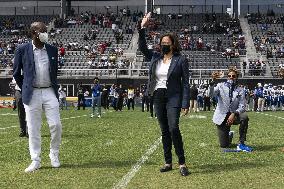 Kamala Harris flips a coin ahead of Howard University vs Hampton University football game