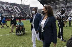 Kamala Harris flips a coin ahead of Howard University vs Hampton University football game