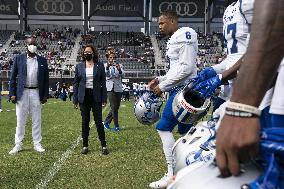 Kamala Harris flips a coin ahead of Howard University vs Hampton University football game