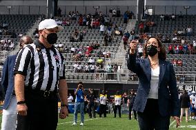 Kamala Harris flips a coin ahead of Howard University vs Hampton University football game