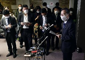 Japan drops blanket halt of inbound flight bookings after criticism