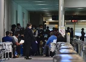 Japan drops blanket halt of inbound flight bookings after criticism