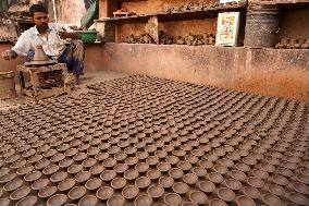 Indian Potter Makes Earthen Lamps for Diwali festival in Ajmer - Rajasthan