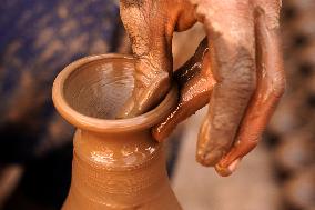 Indian Potter Makes Earthen Lamps for Diwali festival in Ajmer - Rajasthan