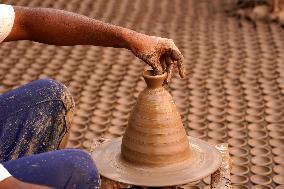 Indian Potter Makes Earthen Lamps for Diwali festival in Ajmer - Rajasthan
