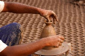 Indian Potter Makes Earthen Lamps for Diwali festival in Ajmer - Rajasthan