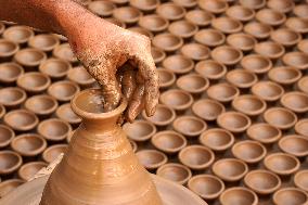 Indian Potter Makes Earthen Lamps for Diwali festival in Ajmer - Rajasthan