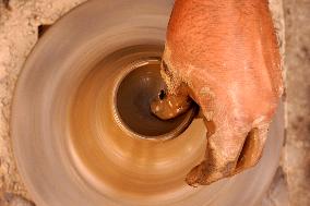 Indian Potter Makes Earthen Lamps for Diwali festival in Ajmer - Rajasthan
