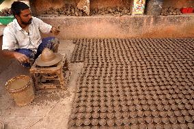 Indian Potter Makes Earthen Lamps for Diwali festival in Ajmer - Rajasthan