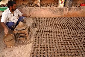 Indian Potter Makes Earthen Lamps for Diwali festival in Ajmer - Rajasthan