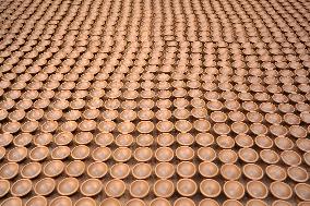Indian Potter Makes Earthen Lamps for Diwali festival in Ajmer - Rajasthan