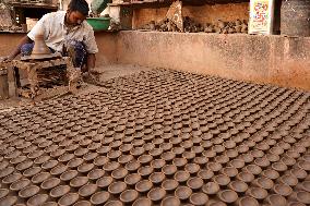 Indian Potter Makes Earthen Lamps for Diwali festival in Ajmer - Rajasthan