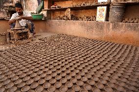 Indian Potter Makes Earthen Lamps for Diwali festival in Ajmer - Rajasthan