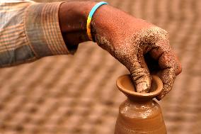 Indian Potter Makes Earthen Lamps for Diwali festival in Ajmer - Rajasthan