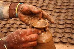 Indian Potter Makes Earthen Lamps for Diwali festival in Ajmer - Rajasthan