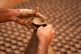 Indian Potter Makes Earthen Lamps for Diwali festival in Ajmer - Rajasthan