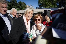 Marine Le Pen Visit To A Market In Gironde