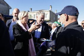 Marine Le Pen Visit To A Market In Gironde