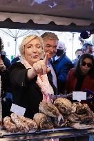 Marine Le Pen Visit To A Market In Gironde