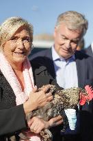 Marine Le Pen Visit To A Market In Gironde