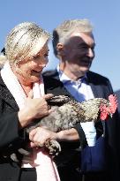 Marine Le Pen Visit To A Market In Gironde