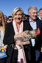 Marine Le Pen Visit To A Market In Gironde