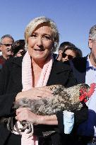 Marine Le Pen Visit To A Market In Gironde