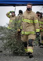 CANADA-RICHMOND-FIREFIGHTERS-CHRISTMAS TREE CHIPPING