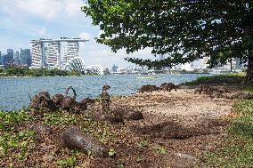 SINGAPORE-SMOOTH-COATED OTTERS