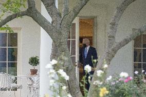 President Joe Biden departs the White House