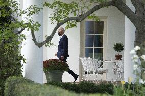 President Joe Biden departs the White House