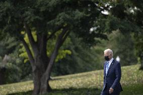 President Joe Biden departs the White House