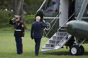 President Joe Biden departs the White House