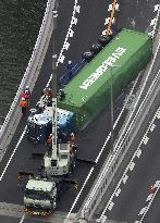 Overturned trailer on highway in Osaka