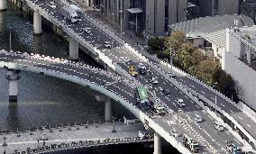 Overturned trailer on highway in Osaka