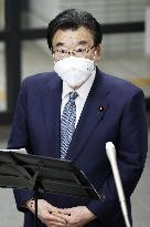 Japan to cut quarantine for COVID close contact to 7 days
