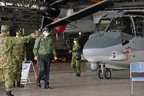 Japan's defense minister boards Osprey