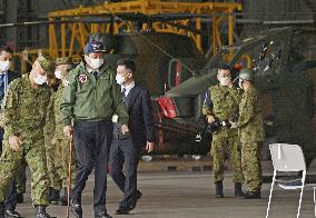 Japan's defense minister boards Osprey