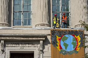 Members of Extinction Rebellion protest at the US Chamber of Commerce