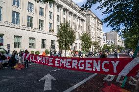 Members of Extinction Rebellion protest at the US Chamber of Commerce