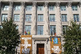 Members of Extinction Rebellion protest at the US Chamber of Commerce