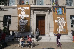 Members of Extinction Rebellion protest at the US Chamber of Commerce