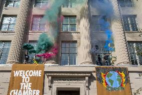 Members of Extinction Rebellion protest at the US Chamber of Commerce