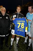 President Macron Poses With Variety Club de France's Jersey - Poissy