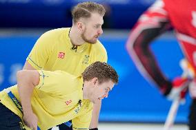 (BEIJING2022)CHINA-BEIJING-OLYMPIC WINTER GAMES-CURLING-MEN'S ROUND ROBIN SESSION-CAN VS SWE (CN)
