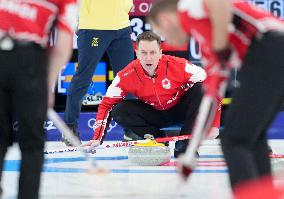 (BEIJING2022)CHINA-BEIJING-OLYMPIC WINTER GAMES-CURLING-MEN'S ROUND ROBIN SESSION-CAN VS SWE (CN)